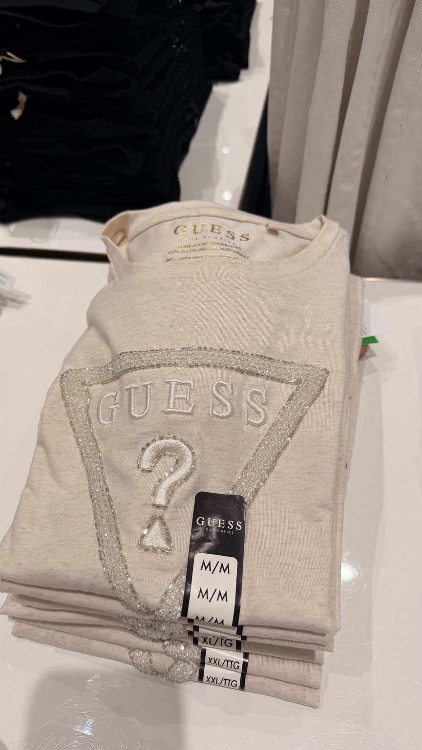 Cream outline triangle GUESS tee