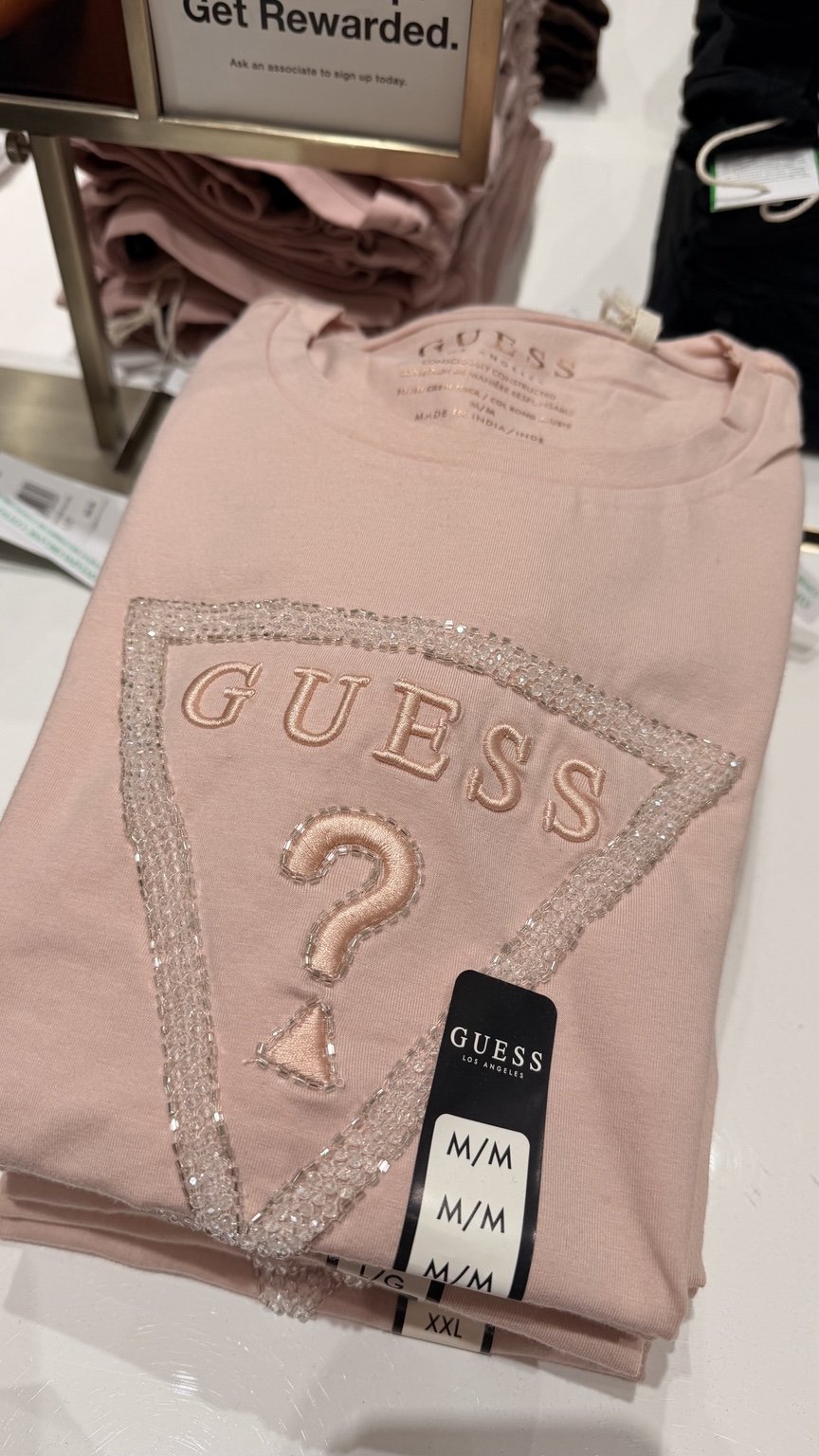 Pink outline triangle GUESS tee