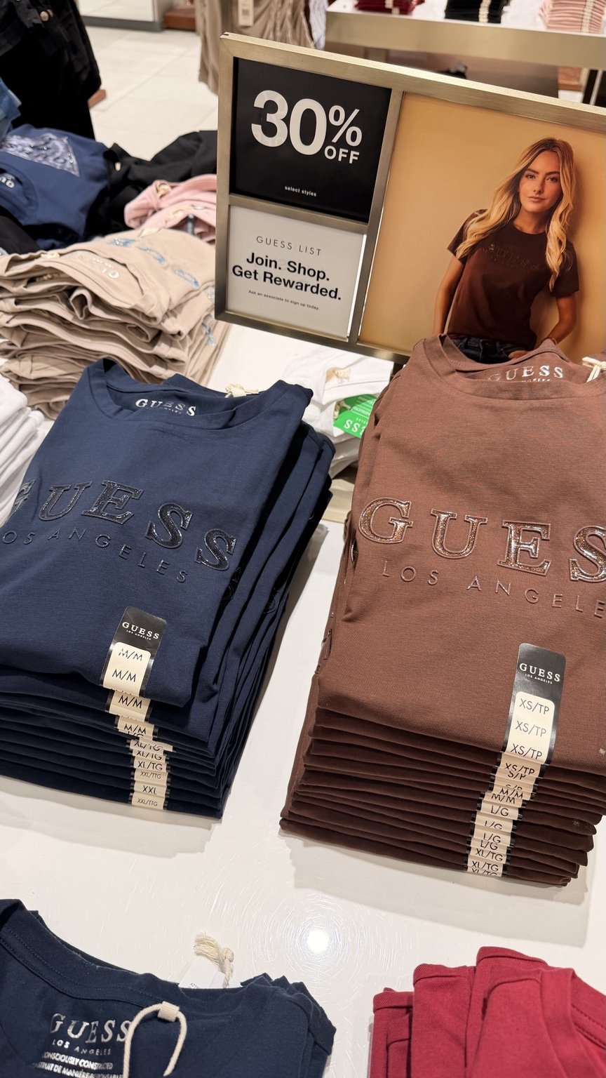 Navy and brown logo tees