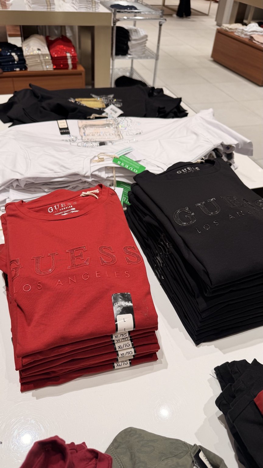 Red and black logo tees