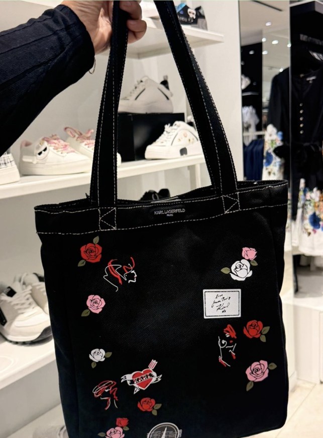Cannes Floral Canvas Tote · Black · snap closure · fits laptop