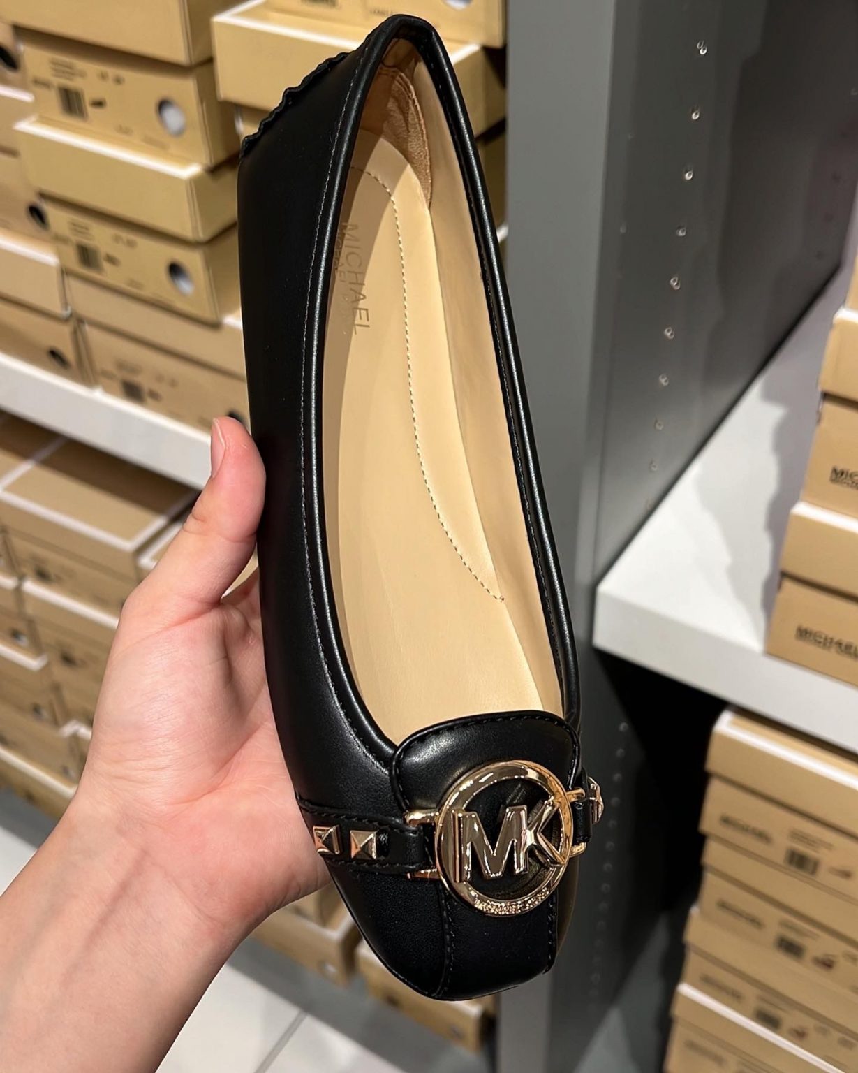 Black MK emblem ballet flats