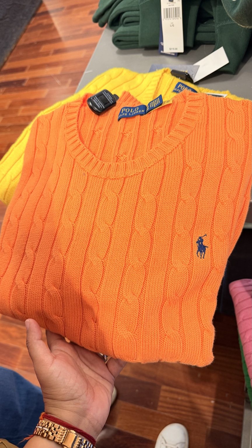 Orange cable-knit sweater