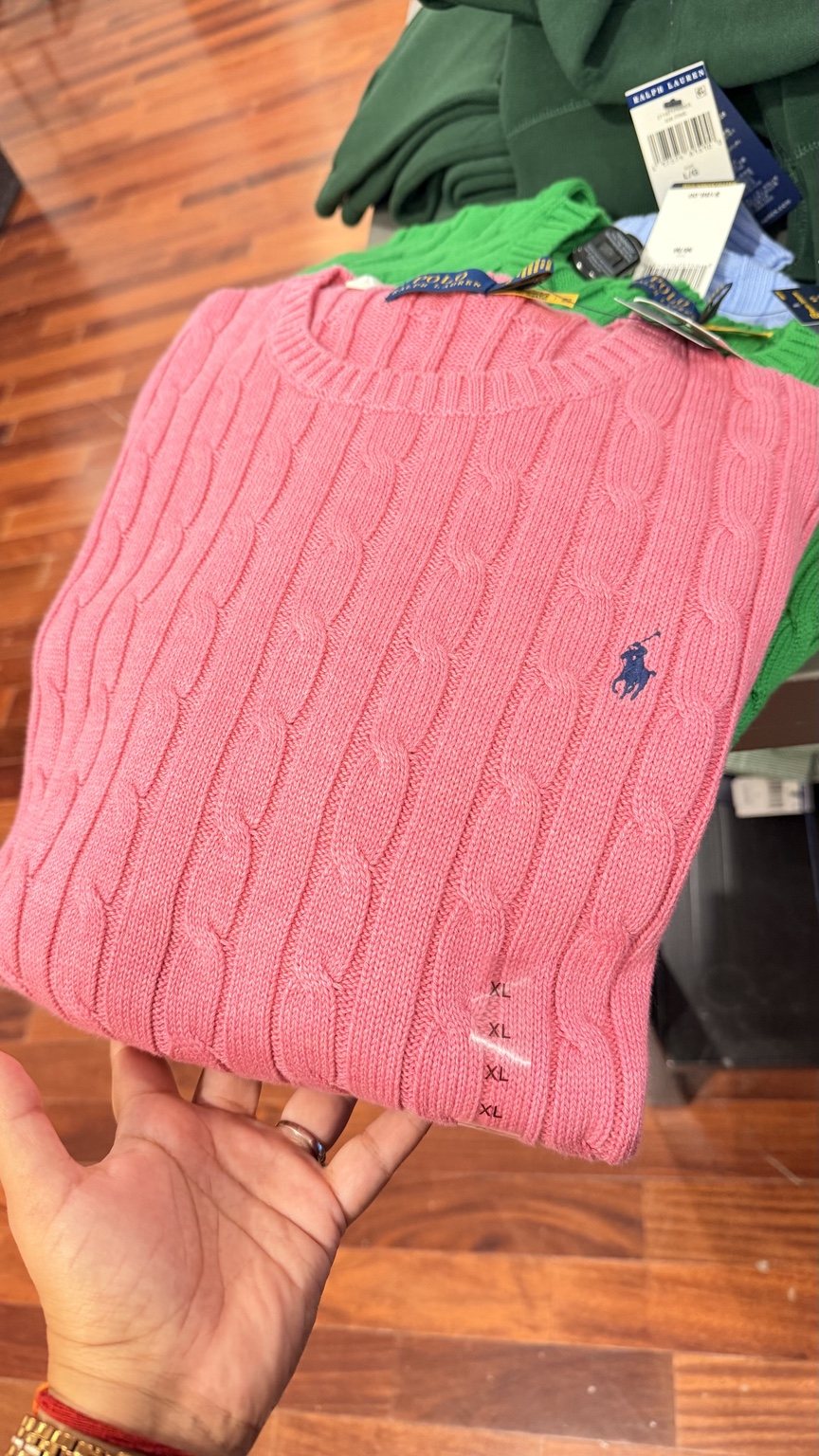 Coral pink cable-knit sweater
