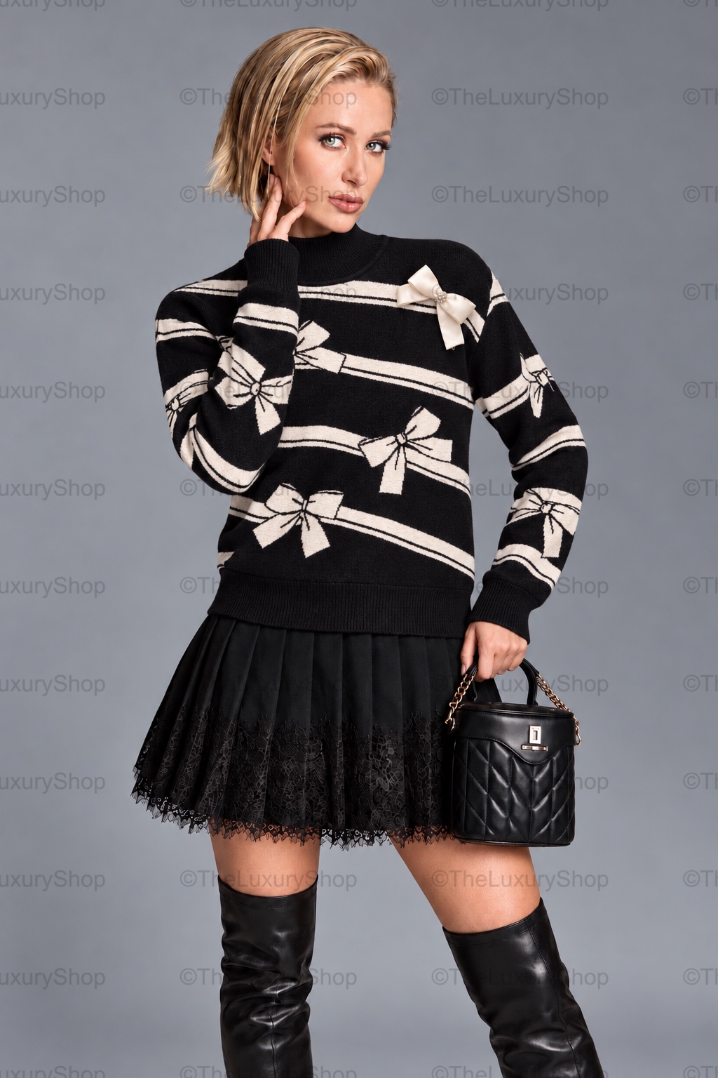 Black and ivory bow stripe sweater