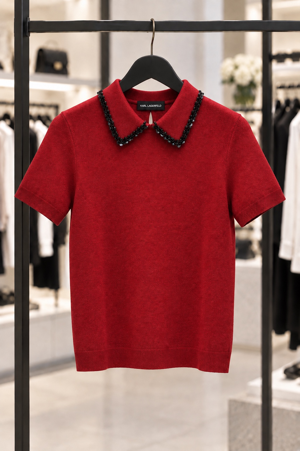 Red knit polo with black collar