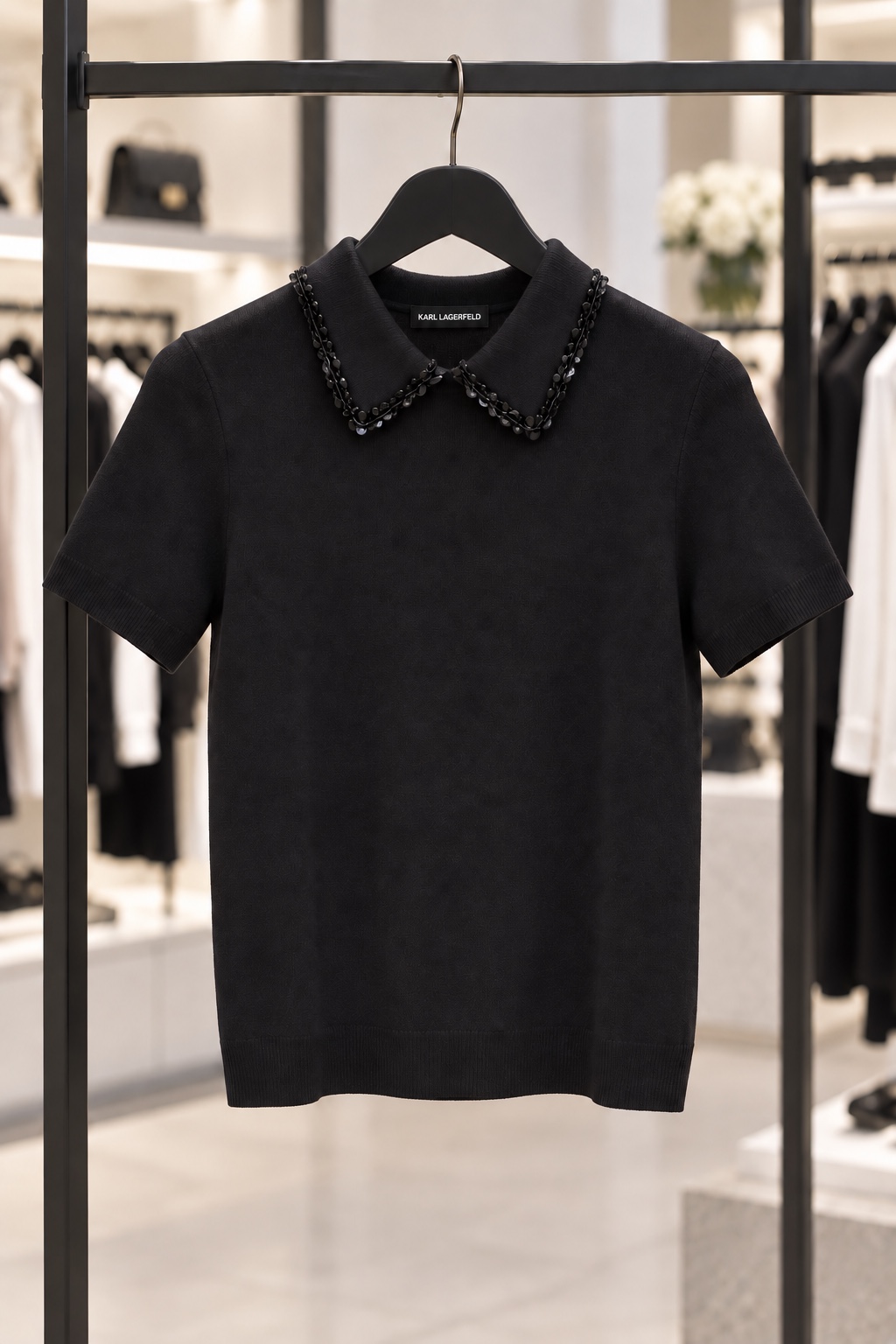 Black knit polo with embellished collar